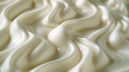 Obraz premium A close-up of white cream with a smooth, luscious texture, perfect for background use.