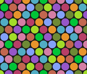 Background of many small colored dots and circles. Backdrop of alternating bright circles different and random colors. Seamless repeat pattern.