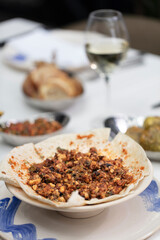 Spicy appetizer. Traditional Turkish and Arabic cuisine meze. Snack meal served alongside the main course. Natural vegetarian food. Bulk appetizer plates.. mezeler