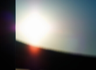 Left aligned wooden doorstep light with flare bokeh backdrop