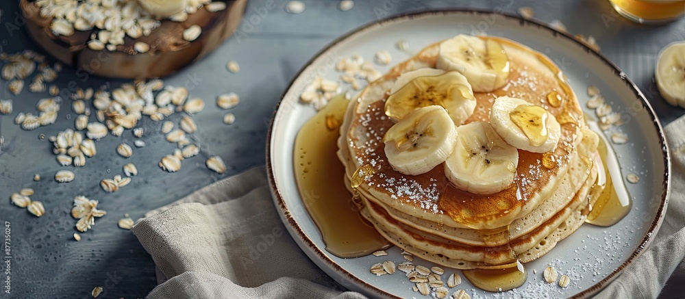 Poster a top view photograph featuring a breakfast spread of fluffy pancakes topped with sliced bananas dri