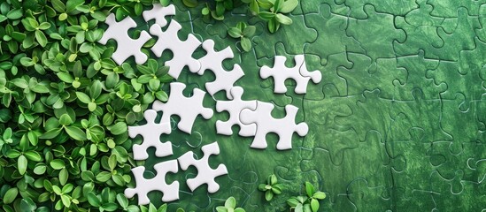 A white puzzle with Fix your credit here symbol on a lovely green background incorporating business ideas and including copy space image