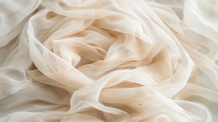 Obraz premium White sheer fabric drapes and flows in soft, gentle waves, creating a delicate and ethereal texture.
