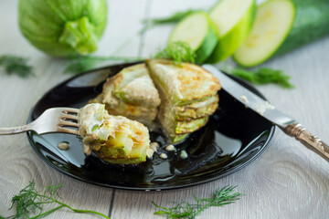 zucchini fried in batter with sauce