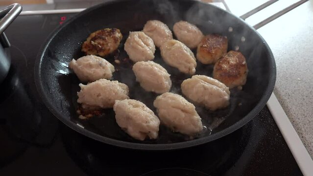 Hirtshals, Denmark A frying pan with fried fish balls, or Fish Frikadeller, a Danish speciality.  