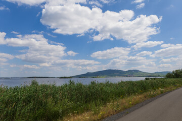 View of Palava across Lake Musov. Blue sky..South Moravia Czech Republic.