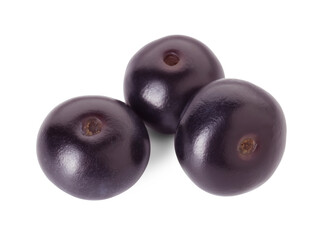 Fresh ripe acai berries isolated on white
