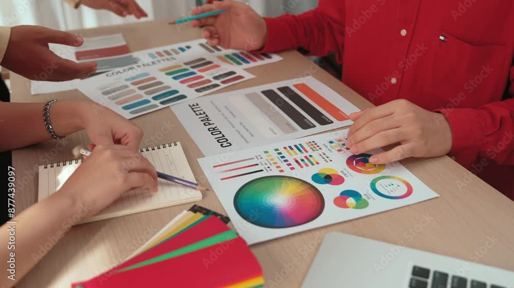 Aufkleber hand closeup of designer team brainstorming and choosing color for graphic design working or client 
