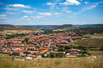 Generic view of the town of Sigüenza, Guadalajara, Castilla-la Mancha, Spain, with the cathedral of Santa María and the castle jutting out from the rooftops