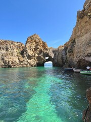 Vibrant turquoise waters in Algarve, Portugal