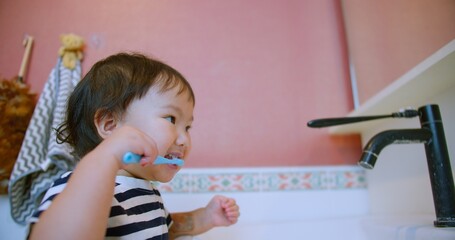 Happy Adorable Toddler Child Brushing Teeth Smiling in Bathroom Morning Routine at Home Interior, showcasing a morning hygiene routine and healthy habits, Personal Care, Family Life, Childhood Moments