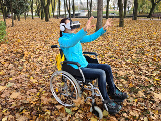 Woman in a Wheelchair Using Virtual Reality Headset in an Autumn Park