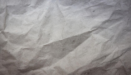 black crumpled paper texture blank dark background with creases