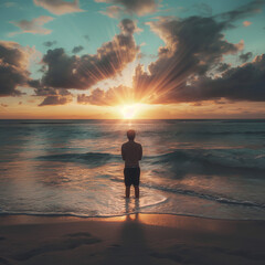 silhouette of a person on the beach, A Man Is Looking At An Ocean Sunset Towards An Ocean Sunset Light Beams In Banner Image Format ,natural beauty,wallpaper