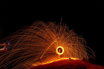 steel wool on fire at night