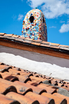 Very attractive and interesting chimney on a rooftop of an old house in Guapulo, Ecuador.