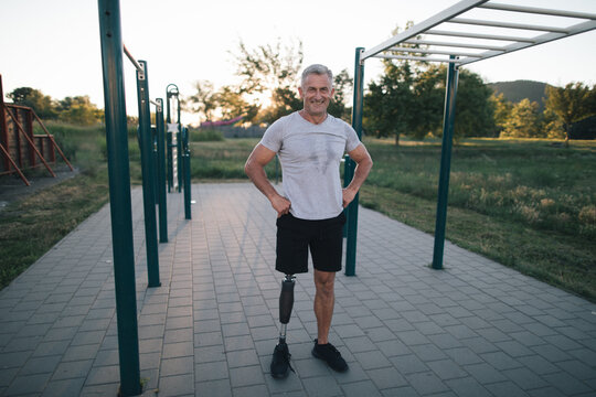 Portrait of active amputee in the open outdoor gym