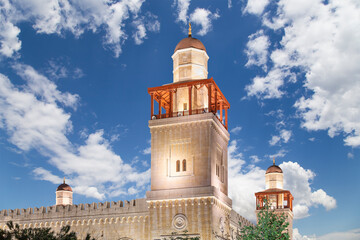 King Hussein Bin Talal mosque in Amman (at night), Jordan.  Against the background of a beautiful sky with clouds