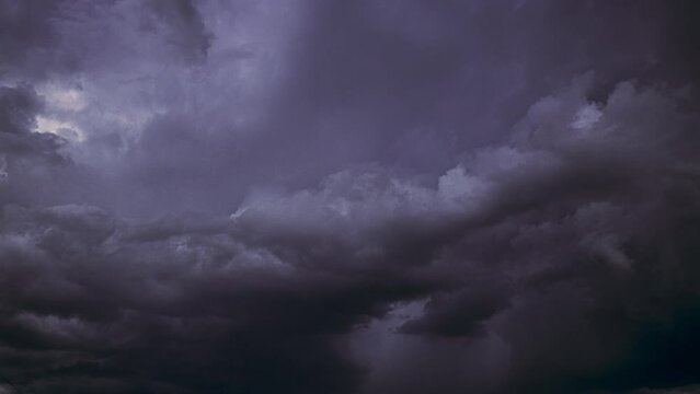 Purple violet magenta Cloudy Sky With Dark Storm Clouds During Rain. Natural Background With Rainclouds. 4K Time Lapse, Timelapse natural weather background dark violet backdrop thunderstorm stormy