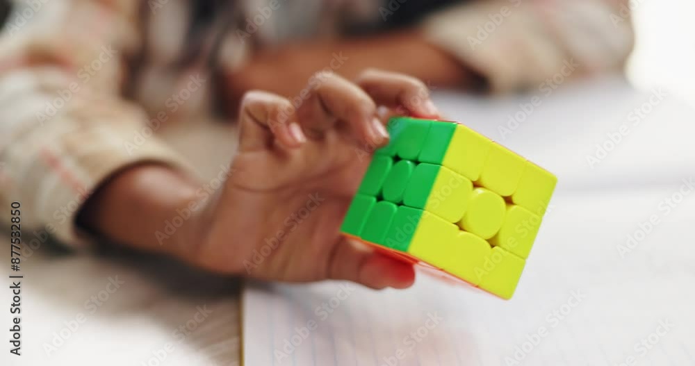 Aufkleber Color, cube and puzzle on hands, challenge and closeup of student in classroom with notebook and desk. Middle school, growth and development of child with game of pattern, solving and goal for kid