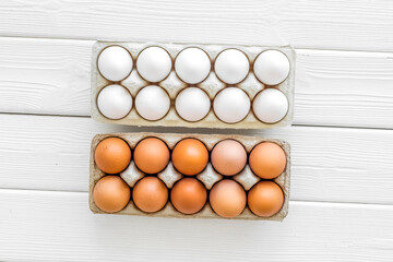 Farm products design for blog with eggs on white wooden backgrou