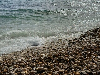 Sea waves on the pebbles beach