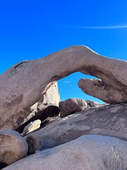 old stone arch in the desert