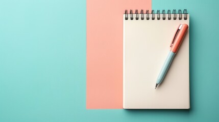 Notepad and pen displayed on a backdrop