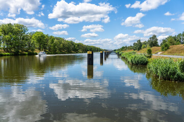 Sunny day in Mittelland Canal, clouds reflected
