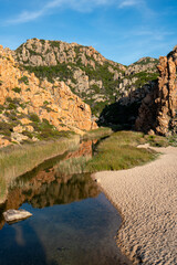 Li Cossi wild beach in Costa Paradiso in Sardinia, Italy