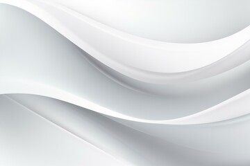 This abstract image features elegant waves in various shades of white and light gray, creating a soft and luxurious texture.