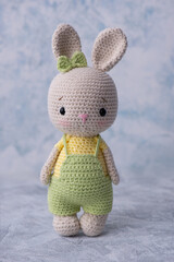 Handmade knitted amigurumi bunny toy