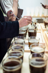 Professional Cup Taster Evaluating Coffee Quality