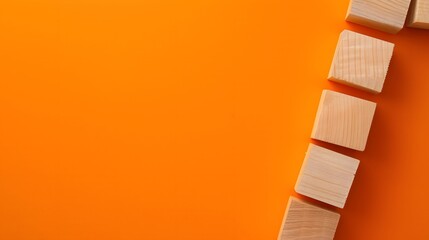 Wooden blocks forming a timeline with milestones on an orange background, representing project management and planning. Flat lay. High quality, no realistic photo details.