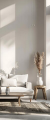 Minimalist living room with white couch, wooden table, and beige rug, showcasing a serene and cozy atmosphere. 