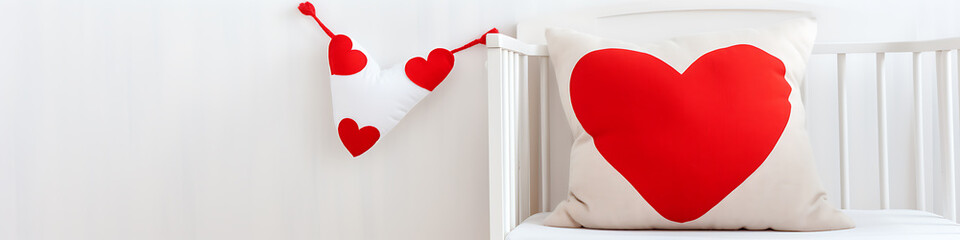 A white crib with red heart shaped pillows, a minimalist design, perfect for Valentine's Day. 