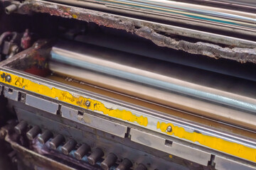 Close up of old offset printed machine.  Paper processing and printing systems. Selective focus.