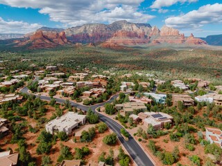 Neighbourhood houses in a desert suburb with mountain range in the background in the town of ...