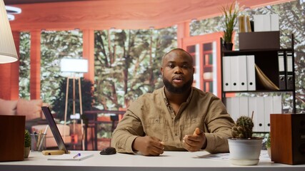 Entrepreneur presenting development strategies and funding plans to shareholders on remote conference call, using data to ensure economic growth. Businessman discussing with investors. Camera B.