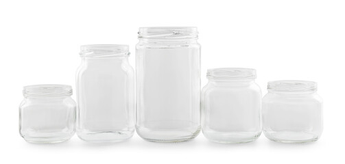 Many empty glass jars isolated on white