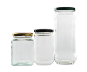 Many empty glass jars isolated on white