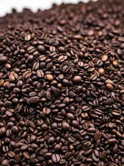 Obraz premium Roasted coffee beans on a white background. Close-up.