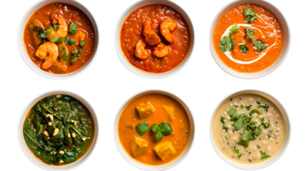 Assorted soups and stews in white bowls.
