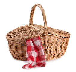 One picnic wicker basket with checkered napkin isolated on white