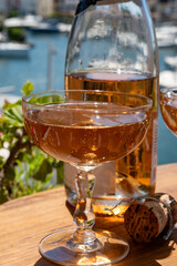 Summer party, French brut rose champagne sparkling wine in coupe glasses in yacht harbour of Port Grimaud near Saint-Tropez, French Riviera vacation, Var, France