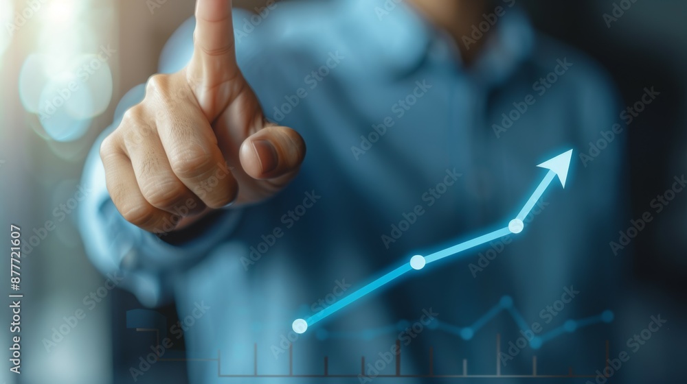 Poster a person is pointing at a graph with a blue arrow, indicating a positive trend