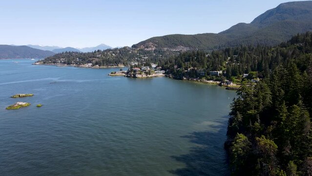 aerial video flying into a bay in West Vancouver on the Salish Sea