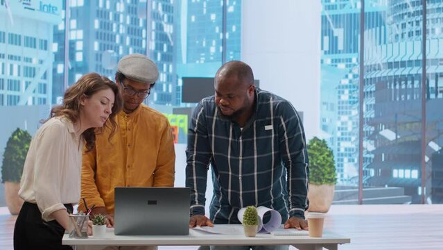 Business clients and a realtor meeting to plan a property investment, negotiating the leasing contract terms and reaching an agreement. Hunting for real estate high class office space. Camera B.