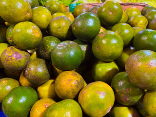 fresh orange fruit sold in market