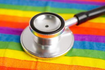 Stethoscope on LGBT rainbow flag, pride month celebrate annual in June social, symbol of gay,...